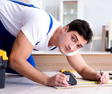 The may laying laminate flooring at home