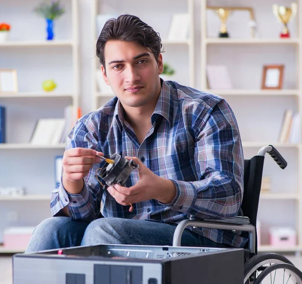 Disabled Man Wheelchair Repairing Computer — Stock Photo, Image