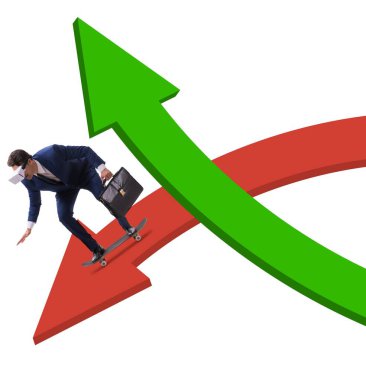 Finans grafiğinde kaykaya binen işadamı