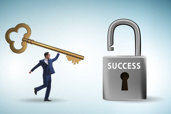 Бизнесмен в ключе к концепции успеха