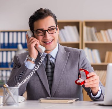 The man making proposal over phone