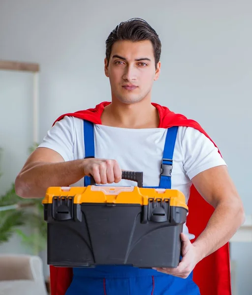 The super hero repairman working at home