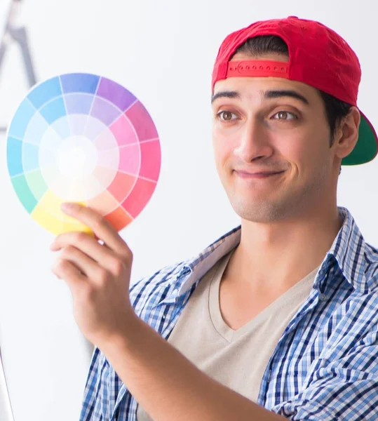 Young Painter Contractor Choosing Colors Home Renovation Stock Image