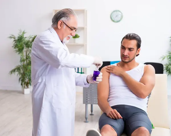 Young Male Patient Visiting Experienced Doctor — Stock Photo, Image