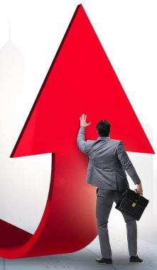 Ekonomideki büyümeyi destekleyen işadamı grafik üzerinde