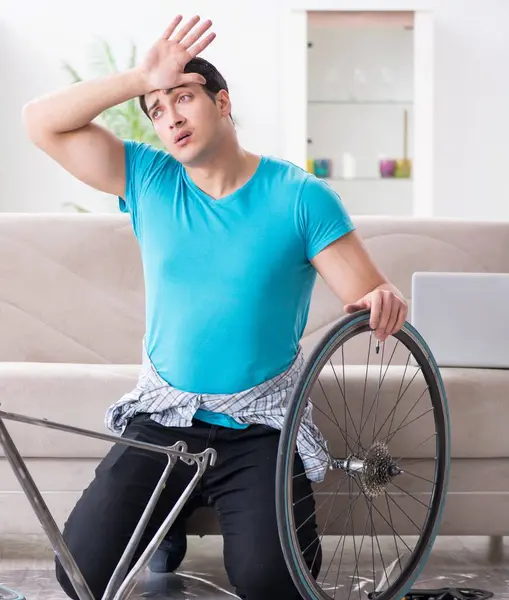Young Man Repairing Bicycle Home — Stock Photo, Image
