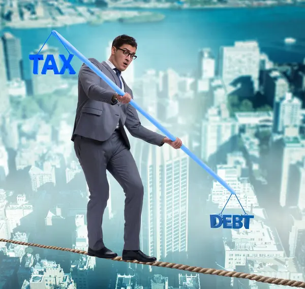 Businessman Balancing Debt Tax — Stock Photo, Image
