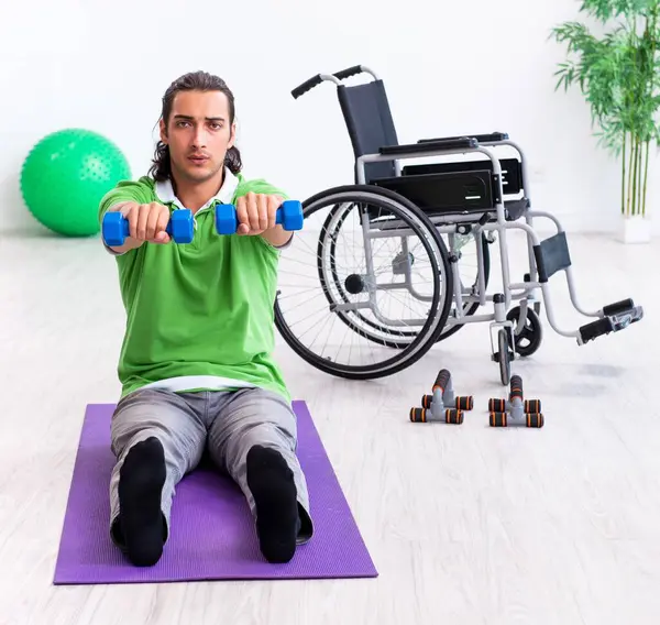 Young Man Wheel Chair Doing Exercises Indoors — Stock Photo, Image