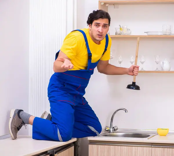 Young Male Contractor Repairing Tap Home — Stock Photo, Image