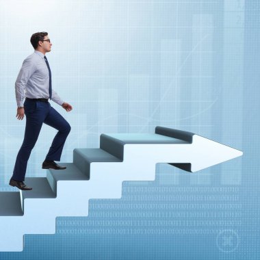 İş adamı kariyer basamaklarını tırmanıyor.