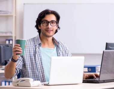 The it specialist working in the office