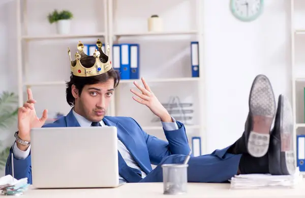 stock image The young king businessman working in the office