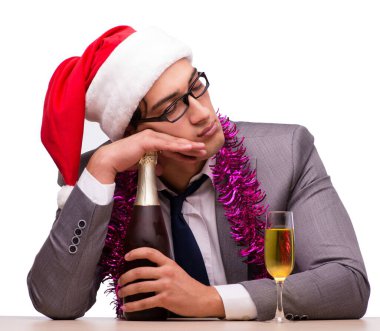 Genç işadamı Noel 'i ofisinde kutluyor.