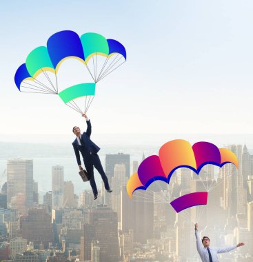 İş adamları paraşütlerin üzerine düşüyor.