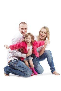 Beyaz gömlekli, kot pantolonlu, pembe çizmeli, kürklü, kollarını açmış, uçmaya çalışan küçük kız çocuğu..