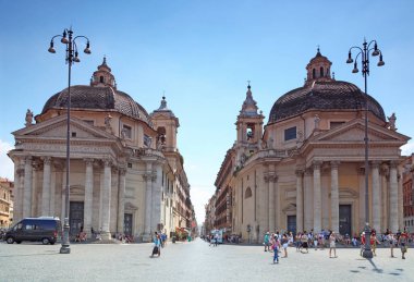 ROME - AUGUST 4: Piazza del Popolo on August 4, 2010 in Rome, Italy. Santa Maria dei Miracoli circular, Santa Maria in Montesanto oval, because arhitetor was cramed building into ensemble. clipart