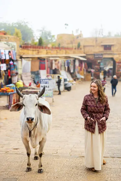Caucasian Woman Walking Next Cow Street Jaisalmer Town India Stock Fotó