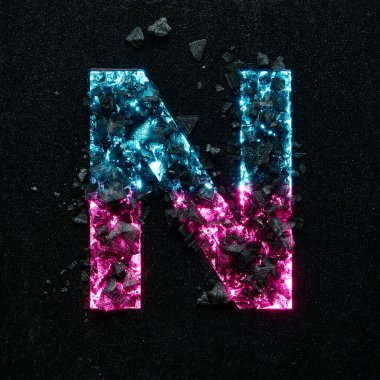 Siyah desenli arka planda siyah taşlı neon renkli büyük harfli yüksek kaliteli fotoğraf..