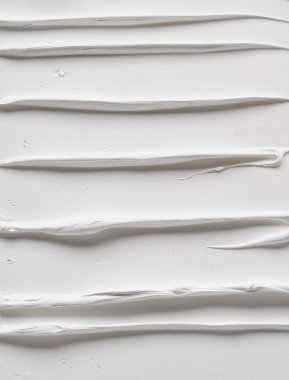 Beyaz akrilik boyanın etkileyici dokusu. Fırça yaratıcı projeler, arkaplan tasarımları veya temizlik ve entelektüellik gerektiren çizimler için idealdir..