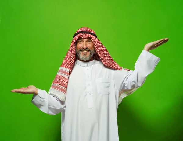 Arab Mature Man Depicts Scales His Hands Different Levels Concept — Stock Photo, Image