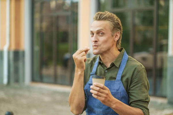 Barista Wearing Apron Demonstrating Delicious Taste Hot Coffee Kissing Fingers — Stock Photo, Image