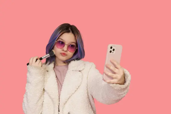 Stylish Teenager Girl Modern Pink Glasses Uses Mobile Phone Mirror — Stok Foto