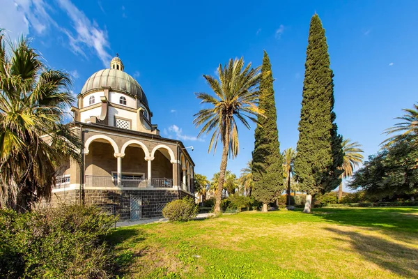 Easter is the feast of the resurrection of Christ. Magnificent monastery surrounded by columns and slender tall cypresses. The Church of the Beatitudes is a Catholic church of the Italian Franciscan convent