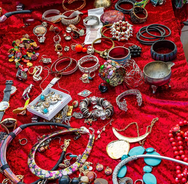 Beads Bracelets Rings Earrings Lined Red Velvet Flea Market Bright — Stock Photo, Image