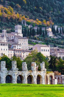 Magnificent Renaissance palace. Roman amphitheater built two thousand years ago. The city of Gubbio in the Umbrian mountains. Winter cold and windy day. Italy. 