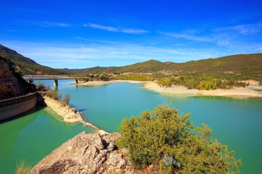 The waters of the Gallego River into the La Penia Reservoir. Province of Las Penias de Riglos. Indian summer in northern Spain. Wonderful day. 