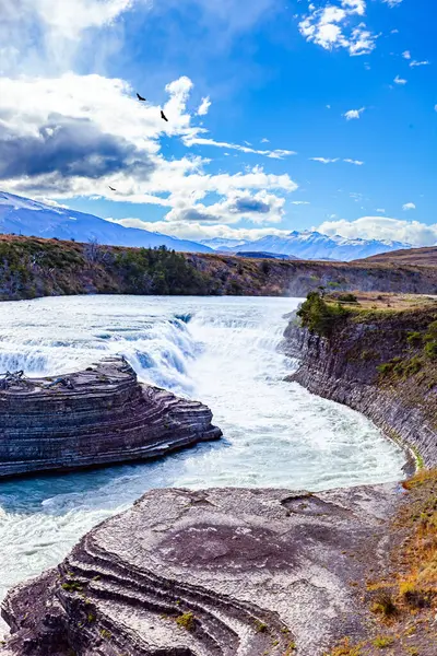 stock image Cascade del Rio Paine. The wonders of the most picturesque and exotic park in the world, Torres del Paine. Waterfalls foam and bubble. Travel to Chile