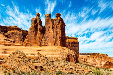  Three gossips. USA. The brightest park of the Arches. The most interesting majestic compositions. clipart