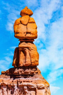 The Elder Sister. The famous red-brown sandstone group Three Sisters. Amazing creations of nature. The result of erosion, wind and water. Goblin Valley in the USA.  clipart