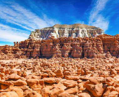 Picturesque park in Utah. Wild Horse Butte. Soft red-brown sandstone and the prairie wind have created thousands of mushroom-shaped hoodoos. Goblin Valley in the USA.  clipart