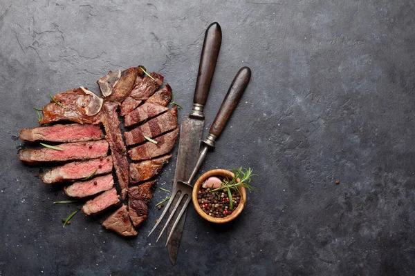 Grilled Porterhouse Beef Steak Sliced Bone Herbs Spices Top View — Fotografia de Stock