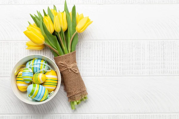 stock image Easter greeting card with tulips and easter eggs. Top view flat lay with space for your greetings