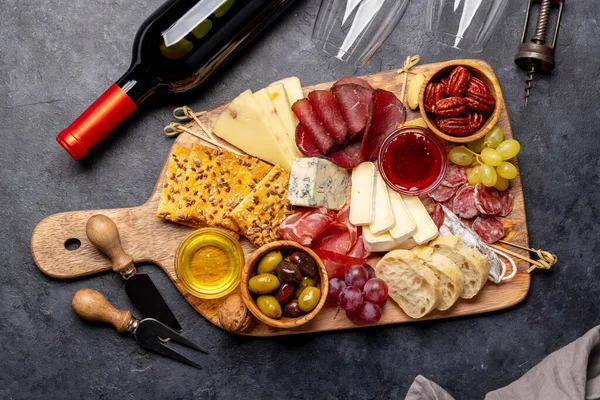 Antipasto Board Prosciutto Salami Crackers Cheese Olives Nuts Flat Lay — Stock Photo, Image