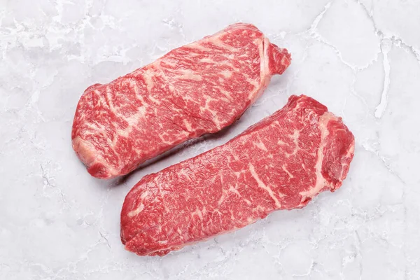 Prime Marbled Beef Steaks Raw Striploin Steak Flat Lay — Stock Photo, Image