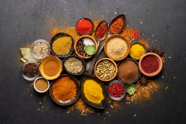 Various Spices Bowls Spoons Stone Table Flat Lay — Stockfoto
