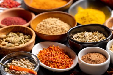 Various spices in bowls. Closeup