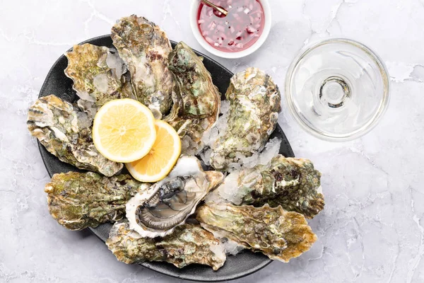 Fresh Oysters Sauce Lemons Glass Sparkling Wine Flat Lay — ストック写真