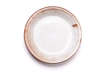 Empty plate isolated on white background. Flat lay