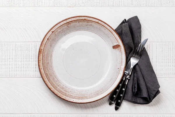 Empty Plate Fork Knife White Wooden Table Flat Lay Copy — Zdjęcie stockowe