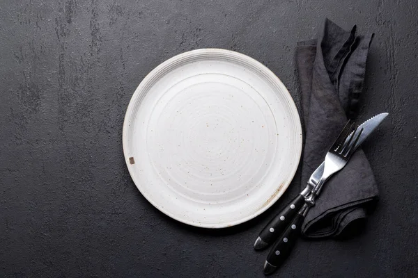 Empty Plate Fork Knife Dark Stone Table Flat Lay Copy — 스톡 사진