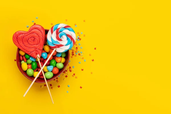 Various Candy Sweets Lollipops Yellow Background Copy Space Your Text — Stock Photo, Image