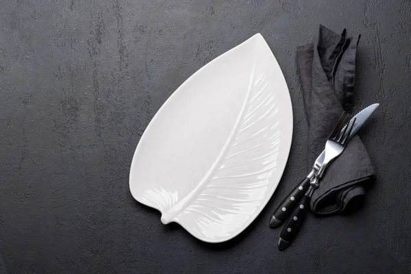 Empty Leaf Shaped Plate Fork Knife Black Stone Table Flat — Stock Photo, Image