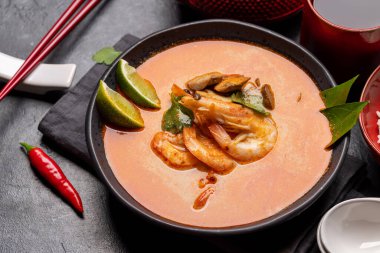 Thai Tom Yum Soup with seafood and tea