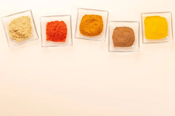 Various Dried Spices Small Bowls Beige Table Flat Lay Copy — Foto de Stock