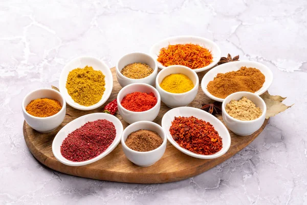 Various Dried Spices Small Bowls Stone Table — Fotografia de Stock