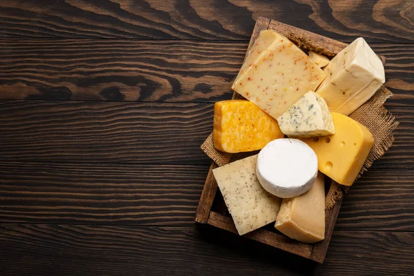 Various Cheese Wooden Box Flat Lay — Stockfoto